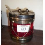 Silver plate and cranberry glass jam pot in the form of a drum with drumsticks handle