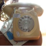A 1960's cream plastic dial telephone