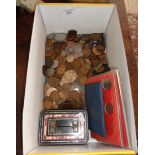 Shoebox containing old coins