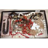 Collection of vintage costume jewellery, beaded necklaces, etc.