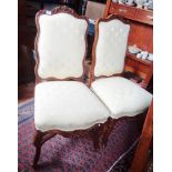 Pair of Continental upholstered chairs, with carved legs and cross stretchers