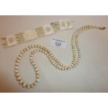 Antique 19th c. ivory beaded necklace and some pierced and carved bracelet panels