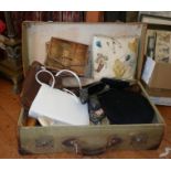 Vintage clothing: suitcase of handbags and ladies' shoes