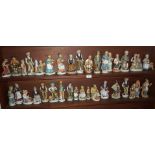 Large collection on two shelves of Continental porcelain figurines