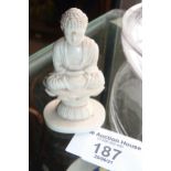 A Chinese carved ivory figure of a seated Buddha, 19th c., signed with red character mark under,