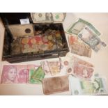 Good quantity of old coins and banknotes in a metal cash box
