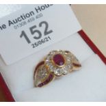 18ct gold ruby and diamond cluster ring, approx 6.5g and a UK size M-N