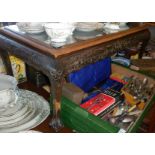 Oriental carved wood coffee table