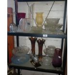 Two shelves of assorted glassware