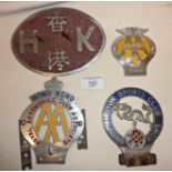 Four automobile association enamel car grille badges, including AA, Hong Kong Motor Sports Club,