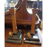 Pair of 1930s oak candlesticks having dogs in kennels carved figures