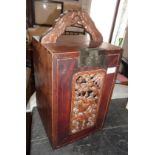 Chinese wooden desktop cabinet with carved and pierced front, dragon handle on top and two