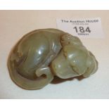 Carved Chinese Celadon jade recumbent dog