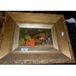 Still life in oils on board of a birds nest with eggs, signed Rattenburg