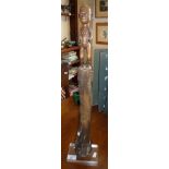 Tribal Art: African Makonda figurative pounder with carved female handle mounted on Perspex and