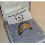 22ct gold wedding band in case, approx 4g and a UK size M-N