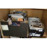 Two boxes of assorted postcards