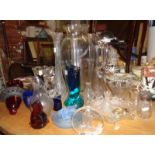 Large collection of assorted glassware, inc. lily vase, coloured glass, etc.