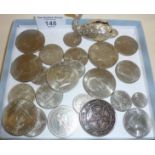 Assorted American coins and a swan menu holder