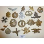 Group of 19 British and German Army Cap Badges and medals, WW1 and later