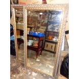 Two large gilt framed wall mirrors
