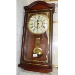 A President quartz Westminster chimes pendulum wall clock in mahogany case (working)