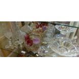 Assorted glassware on one shelf, inc. two decanters