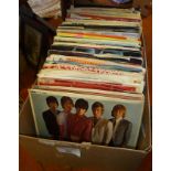 Approximately one hundred assorted vinyl single records