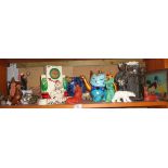Ceramic model group of a Punch & Judy booth and novelty cat teapot and other