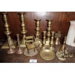 Four pairs of brass candlesticks etc.
