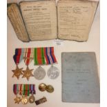 Group of four WW2 medals with matching miniature group, and RAF Airman's service books, all relating