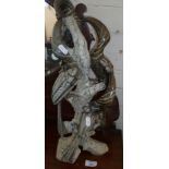 African carved stone sculpture of birds on a tree trunk (A/F)
