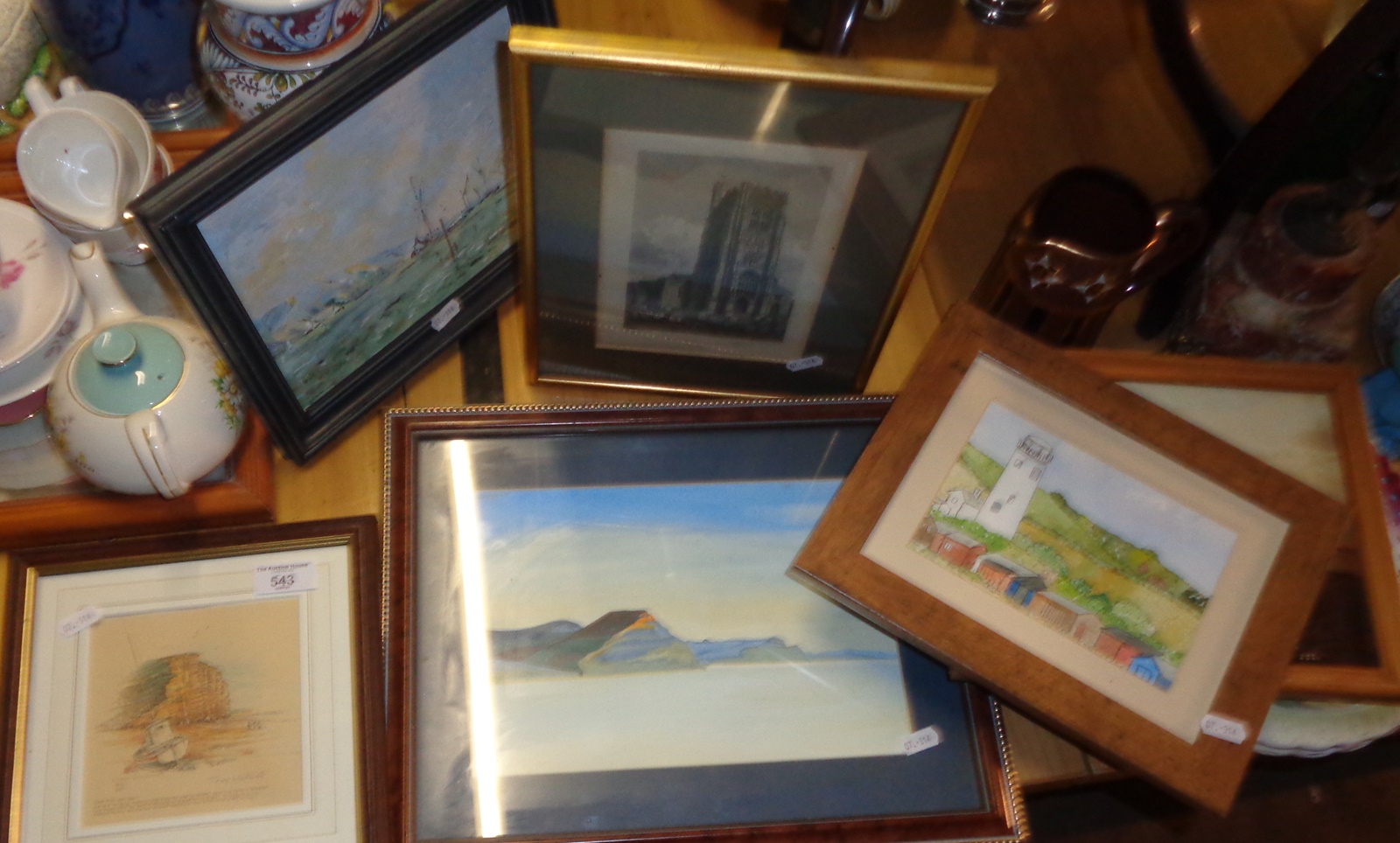 Six various paintings and prints of local scenes, inc. Terry Whitworth print of East Cliff, etc.