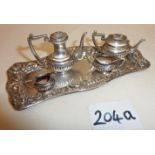 Sterling silver repoussé pin tray with a four piece doll's house miniature tea set - total weight