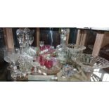 Assorted glassware on one shelf, inc. two decanters