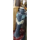 Large classically inspired urn shaped painted plaster lamp standard base having lions heads and