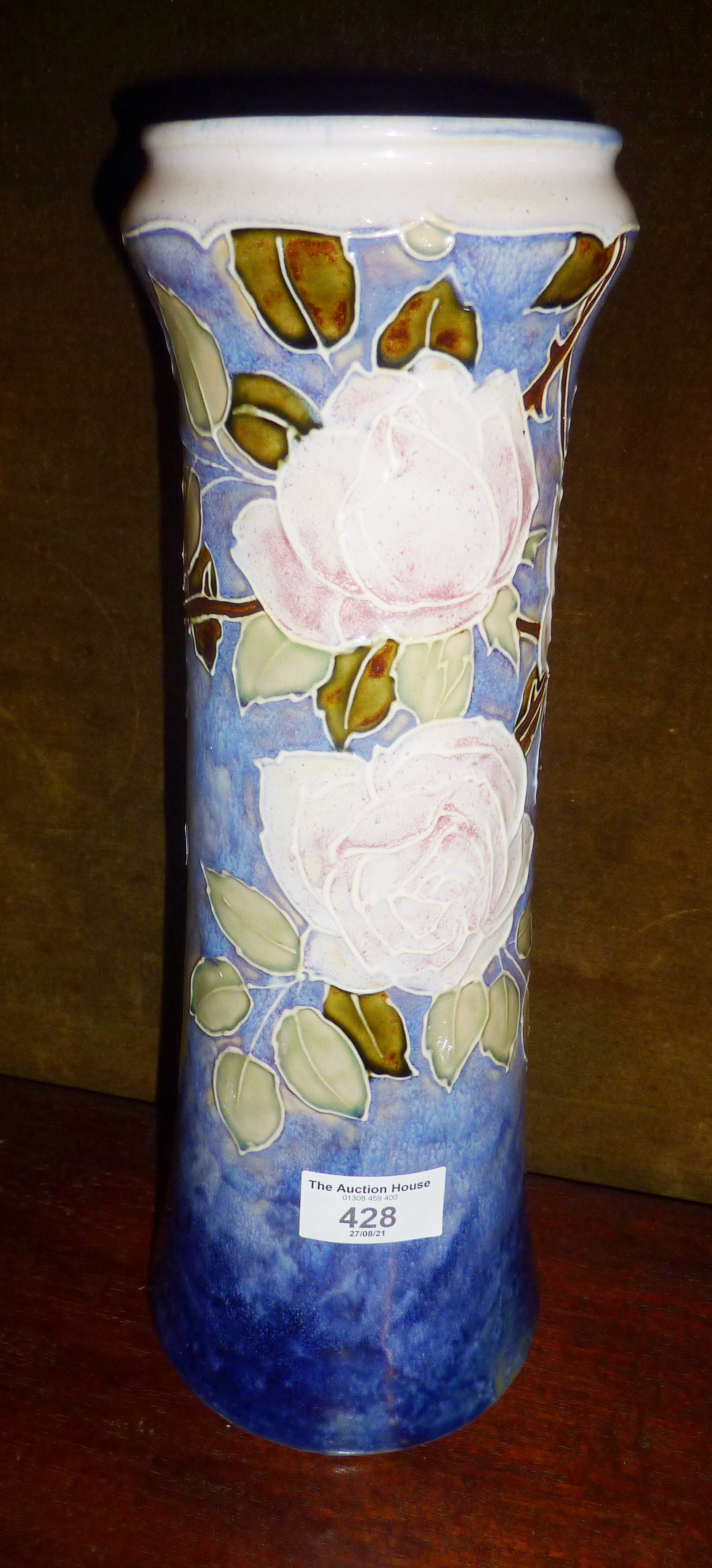 Tall Royal Doulton stoneware vase with tube lined floral decoration by Maud Bowden, 13"