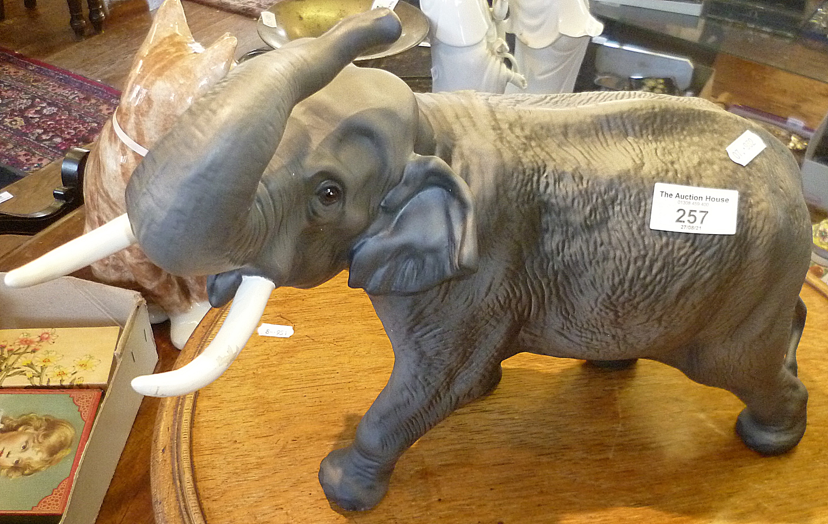 A large Beswick matt glazed china elephant figure, 15" long