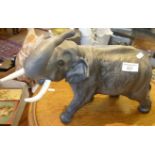 A large Beswick matt glazed china elephant figure, 15" long