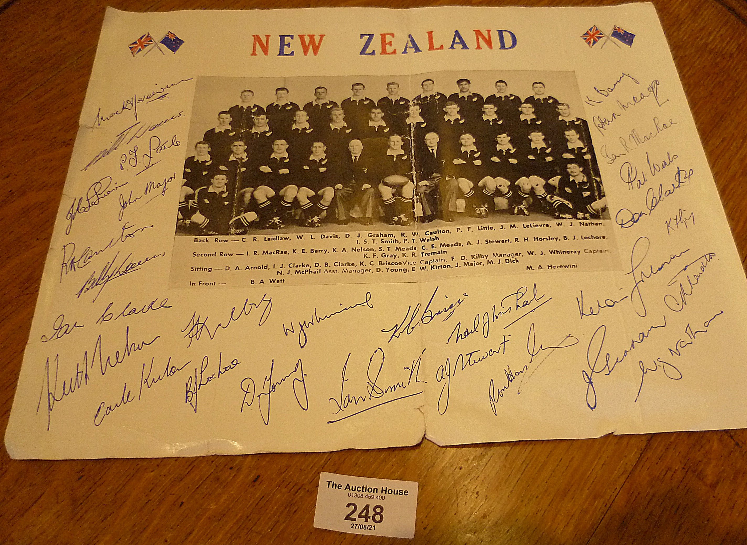 Signed team photo of New Zealand All Blacks, inc. Ian Smith, W.J. Whineray, K. Briscoe et al