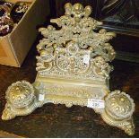 Rococo style brass desk stand with integral letter rack, inkwells and pen tray
