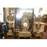 Continental ormolu, bronze and marble clock garniture set by Imperial, the clock being flanked by