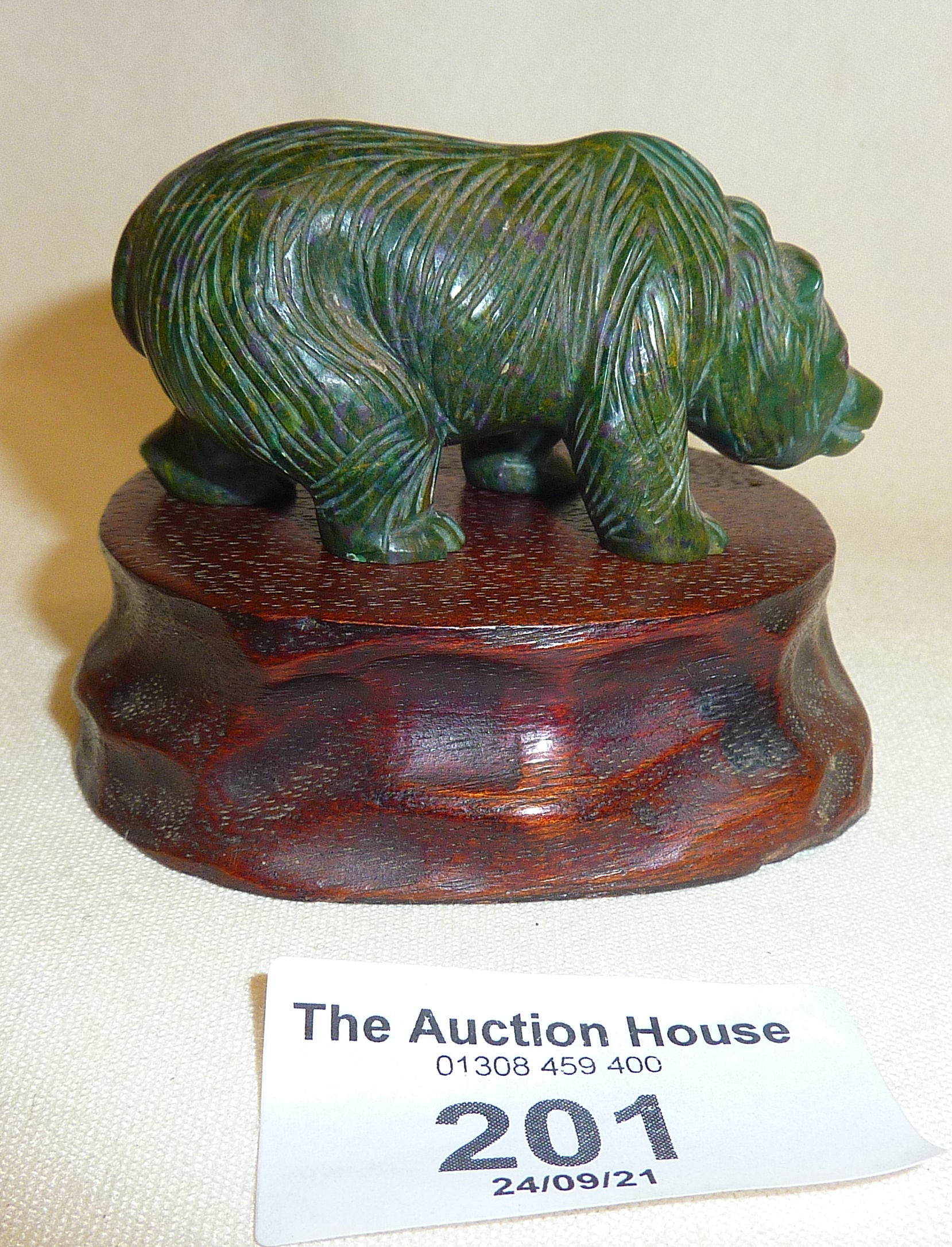 Small carved green hardstone Russian bear with red glass or semi-precious stone eyes, possibly - Image 2 of 3