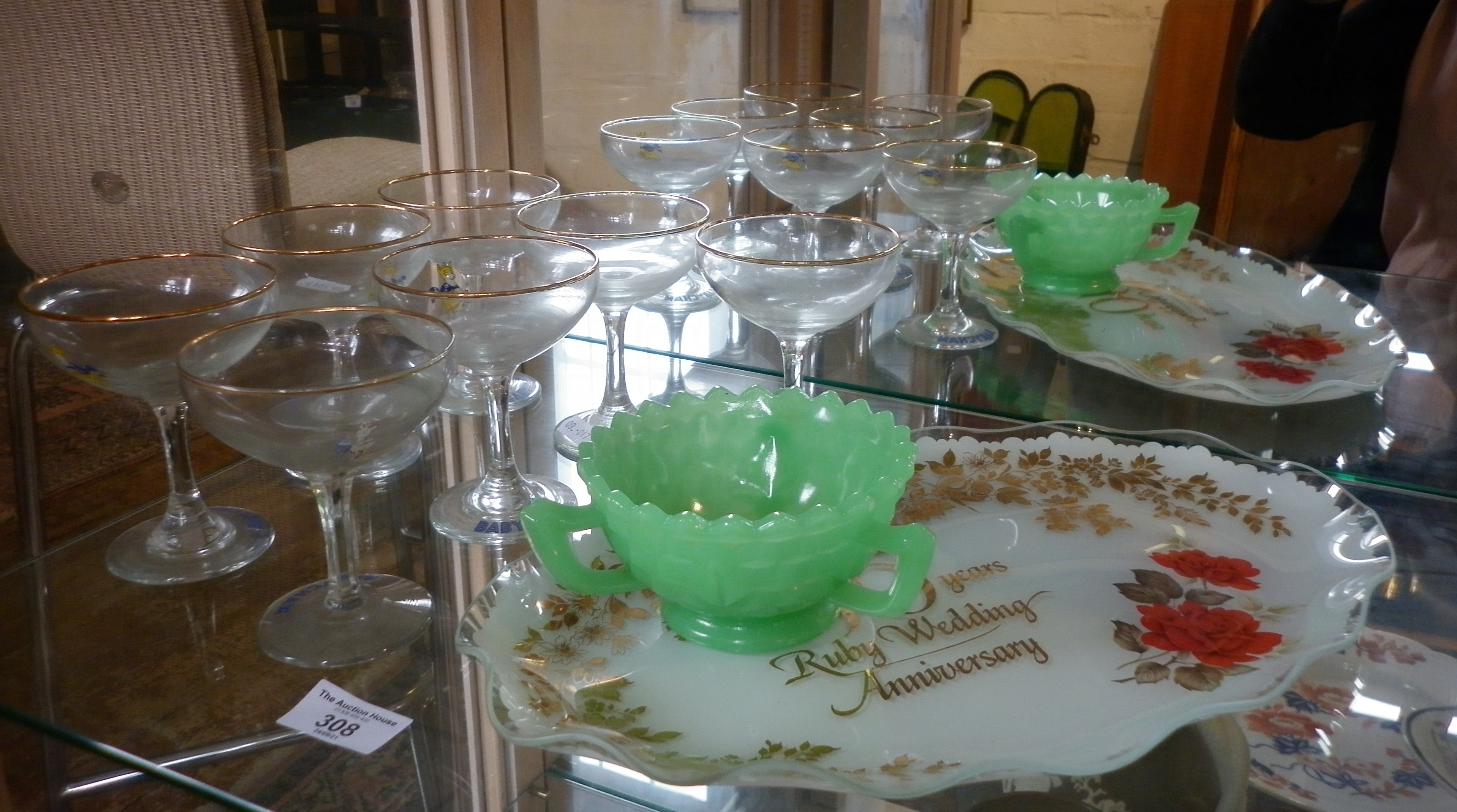 Seven Babycham glasses and two other glass items