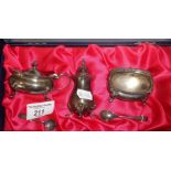 Silver cruet set in case