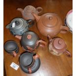 Chinese Yixing tea pots and cups with saucers