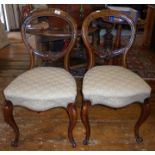 Pair of 19th c. carved mahogany balloon back dining chairs on cabriole legs