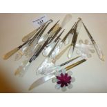 Mother of pearl handled manicure tools, button hooks, Chinese engraved thread winders, etc.