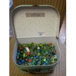 Collection of marbles in vanity case