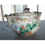 Chinese teapot with turtle on lid and bamboo handle